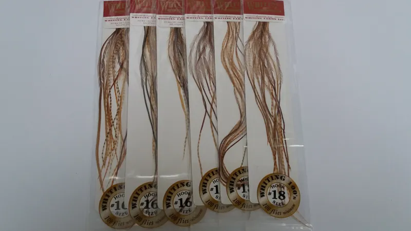 Whiting 100 Saddle Hackle Pack in Barred Dark Ginger-1